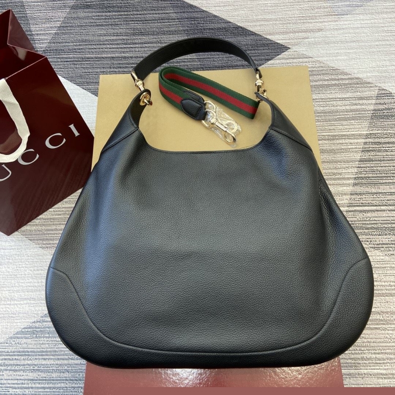 G*u*i top handle bags